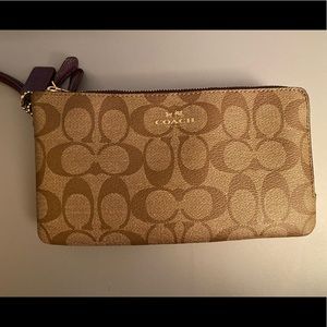 Authentic Coach Wallet. Basically brand new and never used.